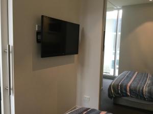
A television and/or entertainment center at Luxury apartment
