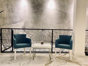 Posezení v ubytování IG Hotel + 37 fotografií