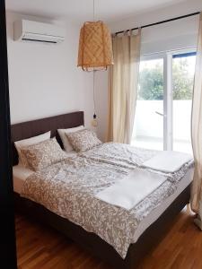 Posteľ alebo postele v izbe v ubytovaní Villa Oleana