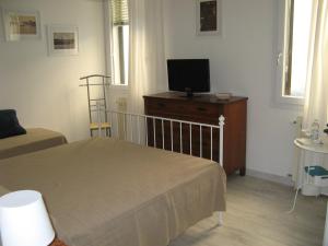 TV a/nebo společenská místnost v ubytování Venice Home