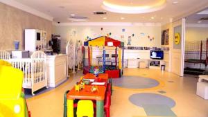 TV a/nebo společenská místnost v ubytování Il Campanario