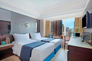 Katil atau katil-katil dalam bilik di Harbour Plaza 8 Degrees