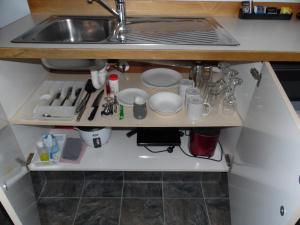 Kuchyň nebo kuchyňský kout v ubytování Pinewood Motels