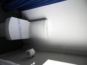 Postel nebo postele na pokoji v ubytování Pinewood Motels