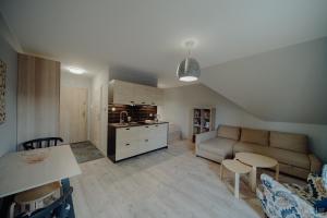 Kuchnia lub aneks kuchenny w obiekcie Apartamenty Silence Górskie Zacisze