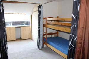 Poschodová posteľ alebo postele v izbe v ubytovaní Moulin2Roues