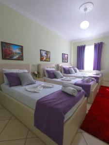 Postel nebo postele na pokoji v ubytování Hotel Bicaj