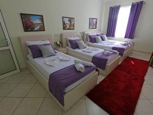 Postel nebo postele na pokoji v ubytování Hotel Bicaj