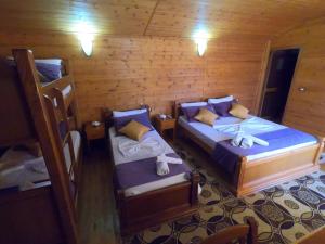 Postel nebo postele na pokoji v ubytování Hotel Bicaj