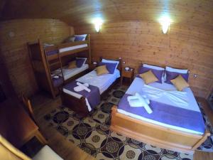 Postel nebo postele na pokoji v ubytování Hotel Bicaj