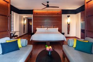 Ein Bett oder Betten in einem Zimmer der Unterkunft The Datai Langkawi