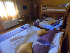 Postel nebo postele na pokoji v ubytování Hotel Bicaj