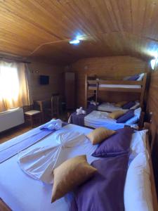 Postel nebo postele na pokoji v ubytování Hotel Bicaj