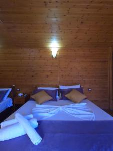 Postel nebo postele na pokoji v ubytování Hotel Bicaj