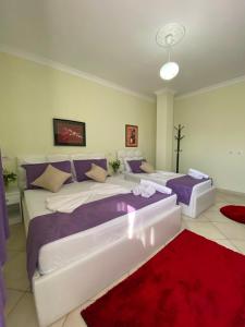 Postel nebo postele na pokoji v ubytování Hotel Bicaj