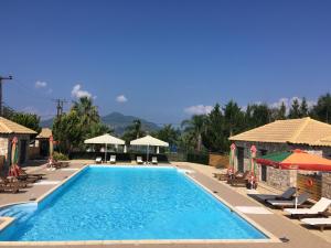 Bazén v ubytování Almyra Holiday Village nebo v jeho okolí