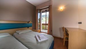 Voodi või voodid majutusasutuse Chalet Felse toas