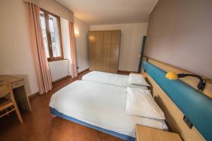 Voodi või voodid majutusasutuse Chalet Felse toas