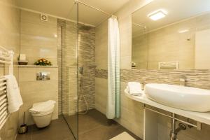 Kúpeľňa v ubytovaní Aparthotel Gimi + 37 fotografií