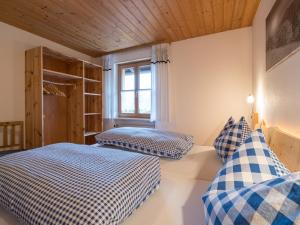 เตียงในห้องที่ Ferienhaus Bach Gotthard