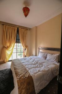 Łóżko lub łóżka w pokoju w obiekcie Top Garden Villa Marrakech
