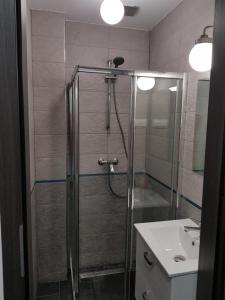Kúpeľňa v ubytovaní MirrorRoom PL Downtown