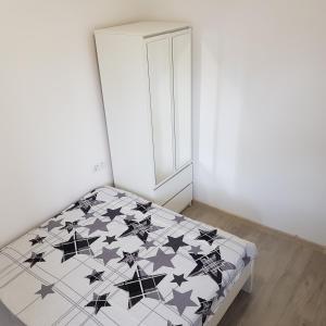 Posteľ alebo postele v izbe v ubytovaní MirrorRoom PL Downtown