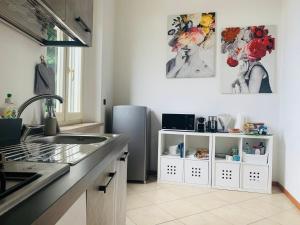 Virtuvė arba virtuvėlė apgyvendinimo įstaigoje My Home by Sveva