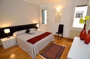 A bed or beds in a room at Da Bruno Homes