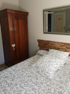 Ένα ή περισσότερα κρεβάτια σε δωμάτιο στο Chambre d'hôte Saint Rémy