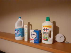 a shelf with milk and other items on it at B&B La Terrazza in Rome