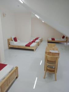 Postel nebo postele na pokoji v ubytování Mango Hotel Dalat