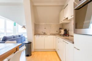 Kuchyň nebo kuchyňský kout v ubytování Modern and Large 2 bedroom apartment in Westende + 4 fotografie