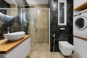 Koupelna v ubytování Nový designový apartmán s klimatizací