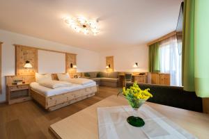 Ένα ή περισσότερα κρεβάτια σε δωμάτιο στο Hotel Waidachhof
