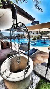 Bazén v ubytovaní Hotel & Wellness Fra I Pini alebo v jeho blízkosti