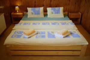 Postel nebo postele na pokoji v ubytování Chata Orlí vrch