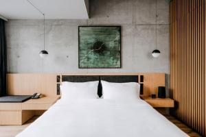 Posteľ alebo postele v izbe v ubytovaní Nobu Hotel Warsaw