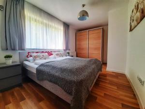 Posteľ alebo postele v izbe v ubytovaní Apartamenty Złoty Widok