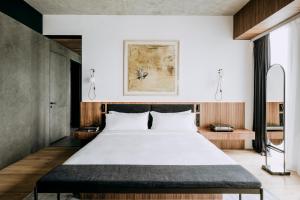 Posteľ alebo postele v izbe v ubytovaní Nobu Hotel Warsaw