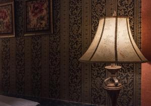 A bed or beds in a room at ホテル ジェムジェム 十三