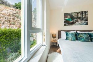 Posteľ alebo postele v izbe v ubytovaní Apartment Olijfboom