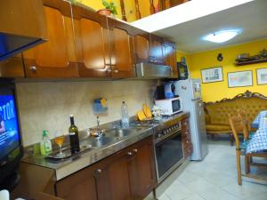 Küche/Küchenzeile in der Unterkunft Villetta I Ciliegi