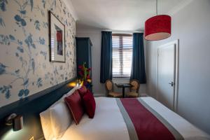 เตียงในห้องที่ New Steine Hotel - B&B