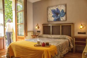 Giường trong phòng chung tại Hotel Valle del Silencio