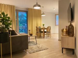 TV a/nebo společenská místnost v ubytování Apartamenty Park