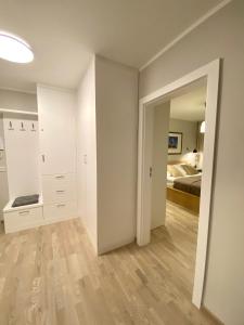 Postel nebo postele na pokoji v ubytování Apartamenty Park