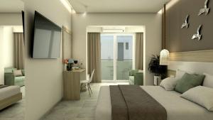 ein Hotelzimmer mit einem Bett und einem TV in der Unterkunft Artemis Comfort&Pleasure in Faliraki