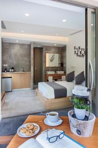 Postel nebo postele na pokoji v ubytování Lilium Luxury Suites