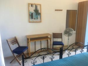 Postel nebo postele na pokoji v ubytování Garden Rooms + 37 fotografií